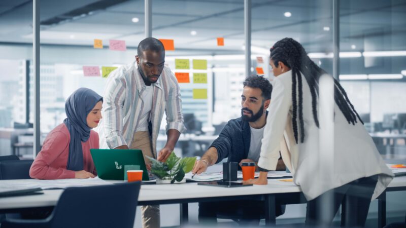 A team working together around a table in the office